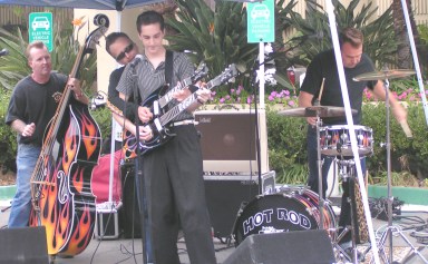 Rick Holland (of the Wildcats) and Rory Justice jam with The Hot Rod Trio at Rock of Ages Car Show.